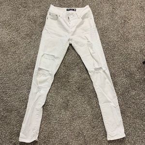mid rise white ripped jeans